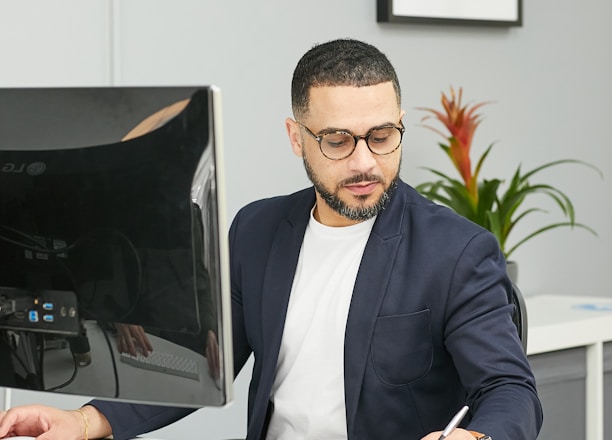 a man sitting at a desk